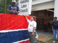 Decorating the Southwest Alabama Labor Council Float at UA Local 119.